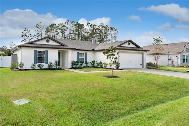 ranch-style house with a garage and a front lawn