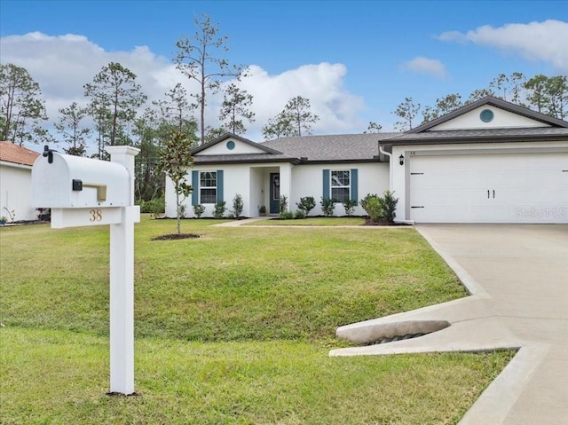 ranch-style home featuring a garage and a front lawn