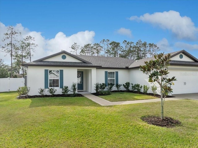 ranch-style home featuring a front yard and a garage