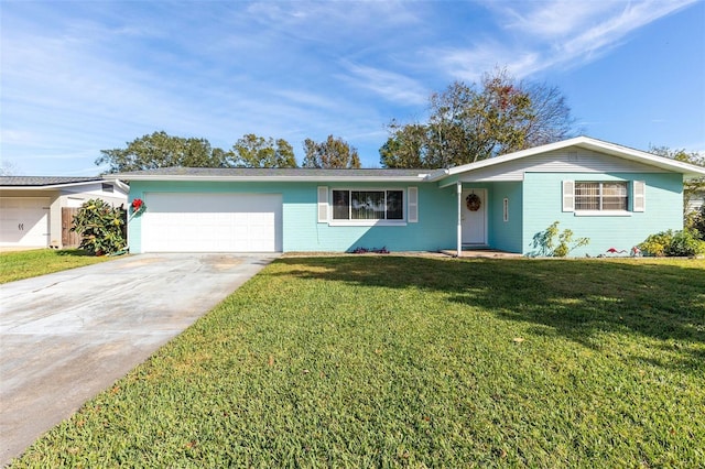 single story home with a front lawn and a garage