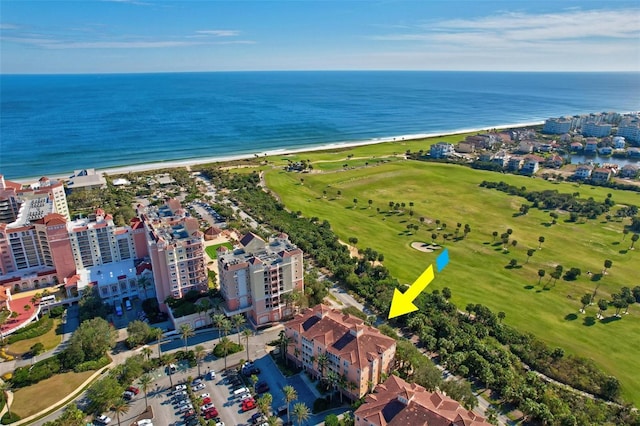 drone / aerial view featuring a view of the beach and a water view