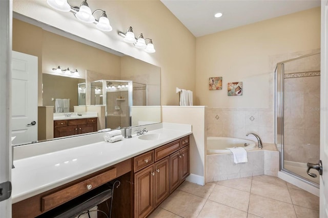 bathroom with separate shower and tub, tile patterned flooring, and vanity