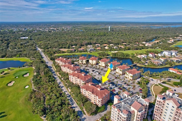 birds eye view of property featuring a water view