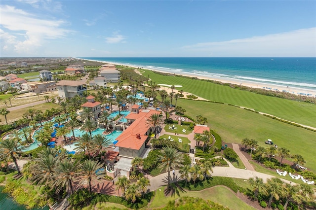 drone / aerial view featuring a view of the beach and a water view