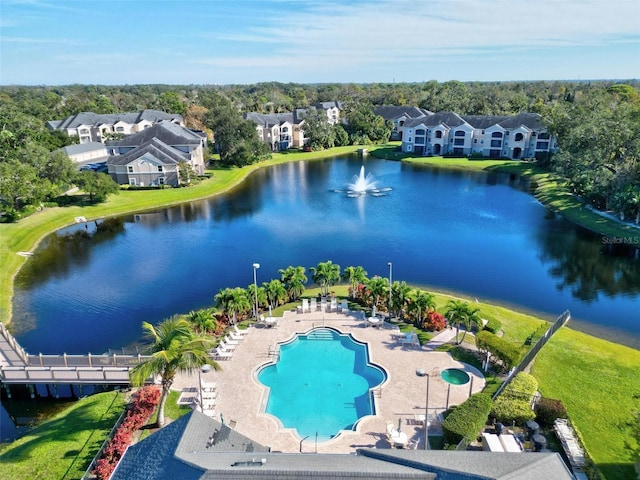 birds eye view of property featuring a water view