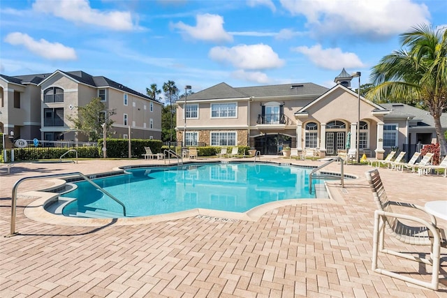 view of pool featuring a patio area