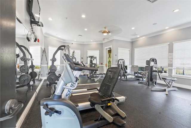 gym featuring ceiling fan and crown molding