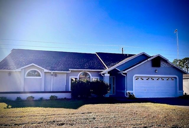 ranch-style house with a garage