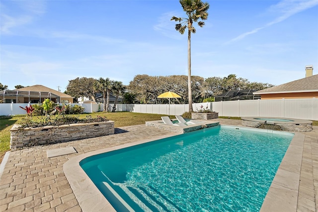 view of pool featuring an in ground hot tub and a patio