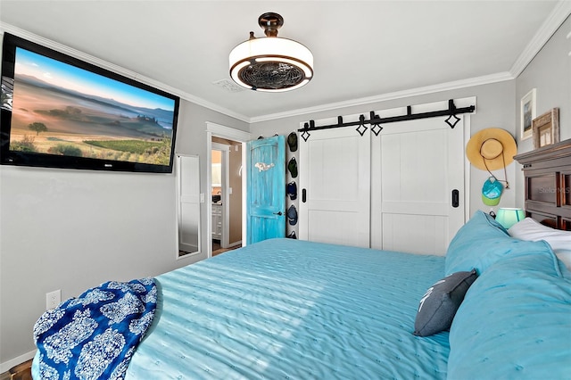 bedroom featuring wood-type flooring, a closet, and ornamental molding