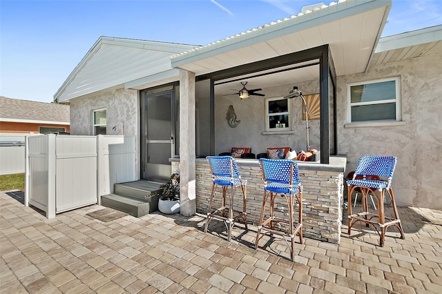 view of patio / terrace featuring an outdoor bar