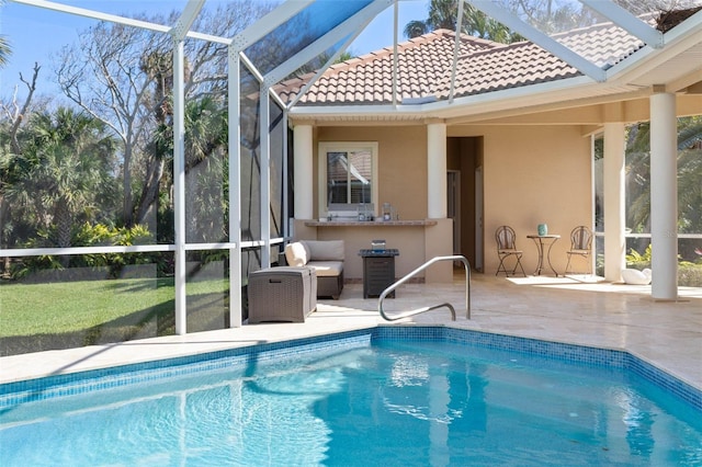 67 Island Estates Pkwy, Palm Coast, FL 32137 - outdoor pool with glass enclosure, a patio area, and a lawn