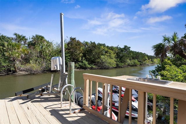 67 Island Estates Pkwy, Palm Coast, FL 32137 - dock with a water view and boat lift