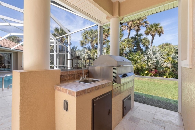 67 Island Estates Pkwy, Palm Coast, FL 32137 - view of patio with area for grilling, a sink, glass enclosure, and grilling area