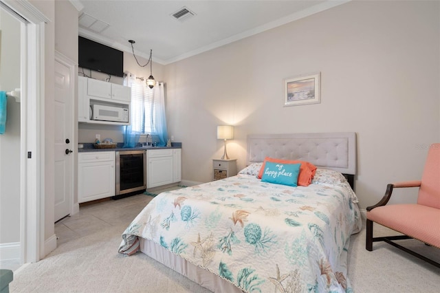 67 Island Estates Pkwy, Palm Coast, FL 32137 - bedroom featuring beverage cooler, ornamental molding, light carpet, bar, and baseboards