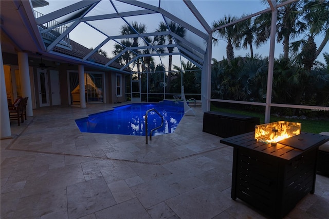 67 Island Estates Pkwy, Palm Coast, FL 32137 - swimming pool with an outdoor fire pit, a patio area, and a lanai