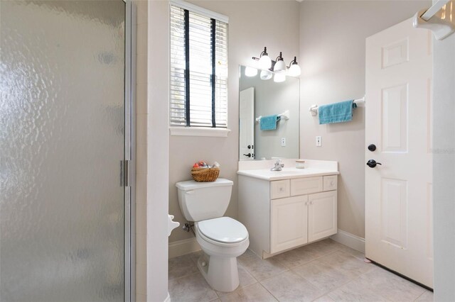 67 Island Estates Pkwy, Palm Coast, FL 32137 - bathroom featuring a stall shower, tile patterned flooring, vanity, and toilet