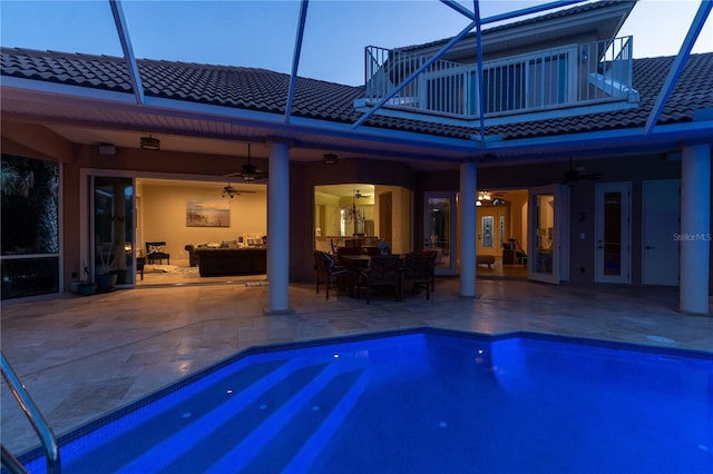 67 Island Estates Pkwy, Palm Coast, FL 32137 - back of property with a tile roof, ceiling fan, and a lanai