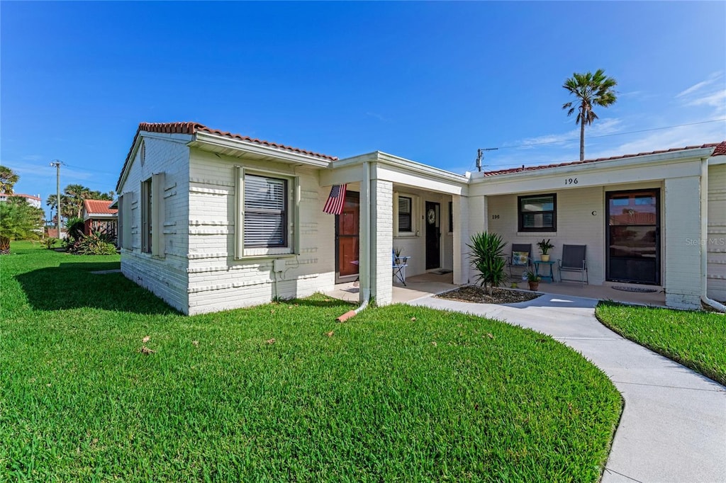 view of front of home with a front yard