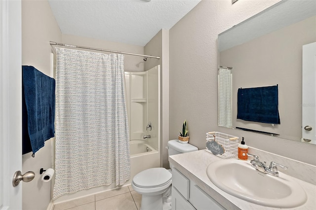 full bathroom featuring vanity, a textured ceiling, shower / bathtub combination with curtain, tile patterned flooring, and toilet