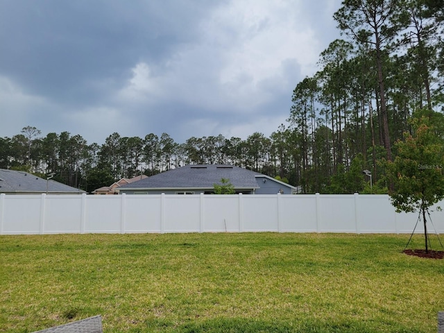 view of yard with fence