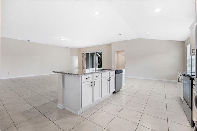 kitchen featuring appliances with stainless steel finishes, a center island with sink, white cabinetry, and sink