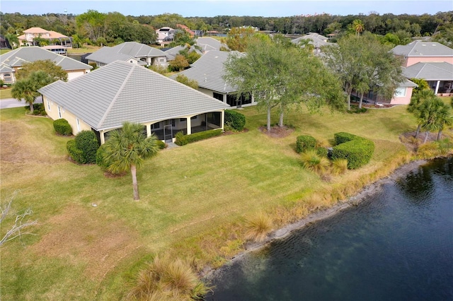 bird's eye view with a water view