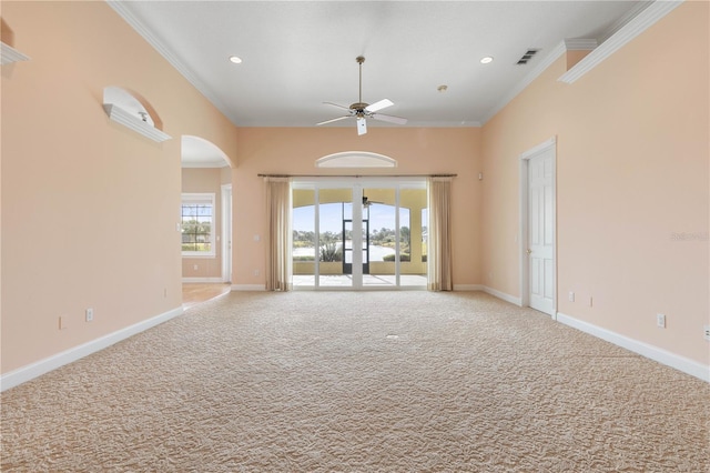 interior space with ceiling fan, french doors, and ornamental molding