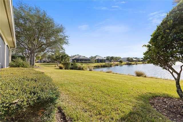 view of yard with a water view