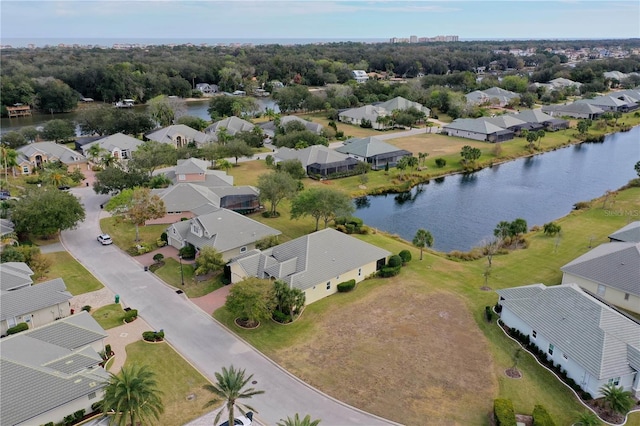 bird's eye view with a water view