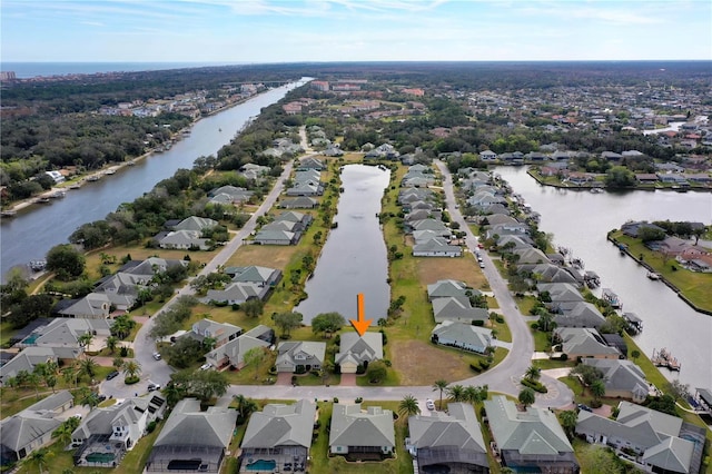 bird's eye view with a water view