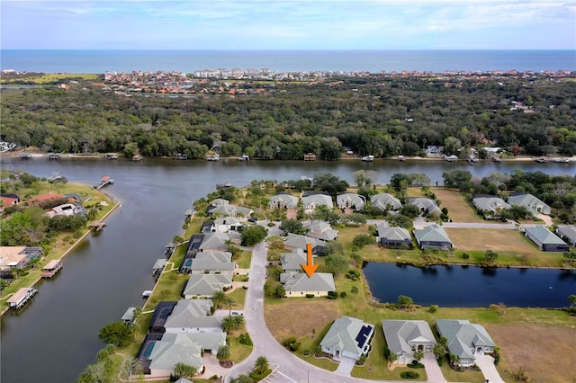 drone / aerial view with a water view