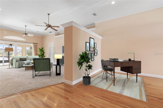 home office with light hardwood / wood-style flooring, ceiling fan, and ornamental molding