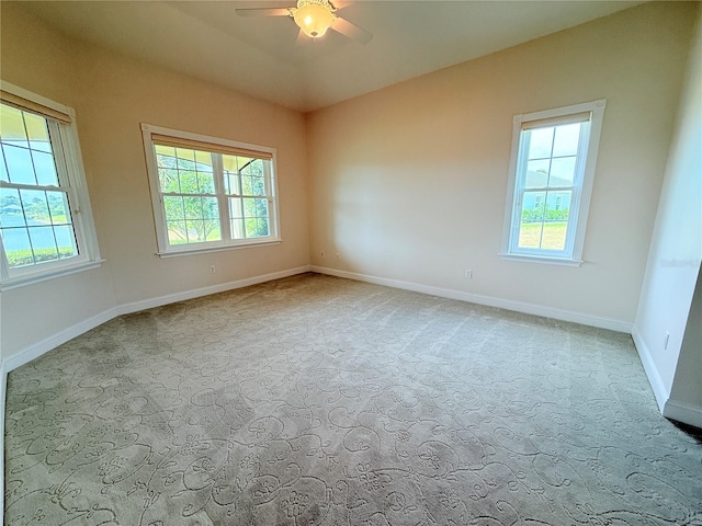88 Longview Way N, Palm Coast, FL 32137 - spare room featuring plenty of natural light, a ceiling fan, carpet flooring, and baseboards