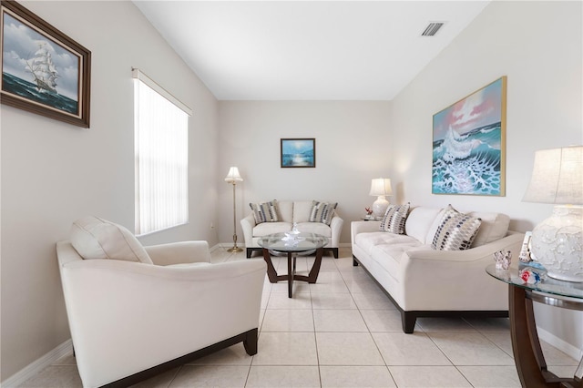 living room featuring light tile patterned flooring