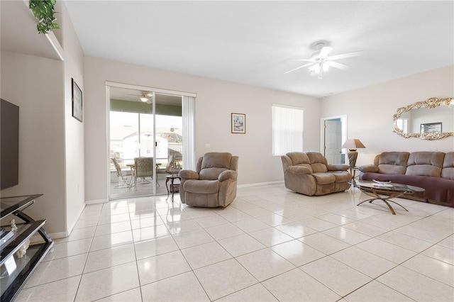 tiled living room with ceiling fan