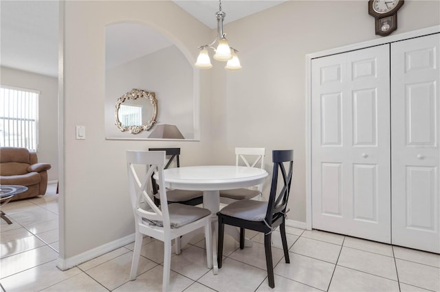 54 Fieldstone Ln, Palm Coast, FL 32137 - dining space featuring baseboards and light tile patterned flooring