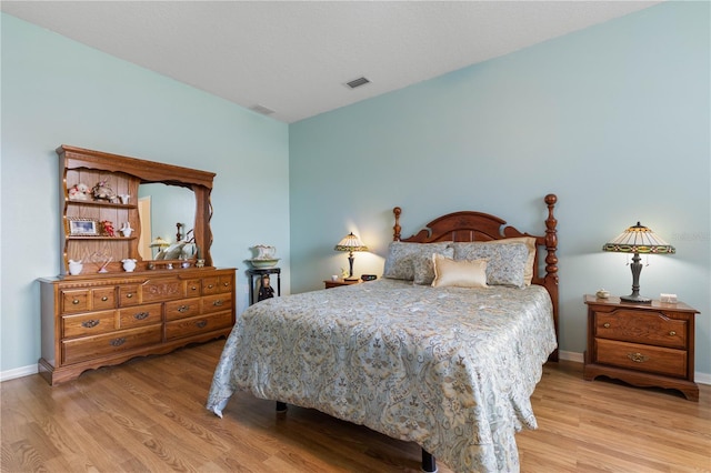 54 Fieldstone Ln, Palm Coast, FL 32137 - bedroom featuring wood finished floors and baseboards