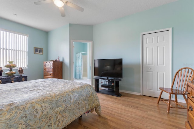 54 Fieldstone Ln, Palm Coast, FL 32137 - bedroom with light wood finished floors and a ceiling fan