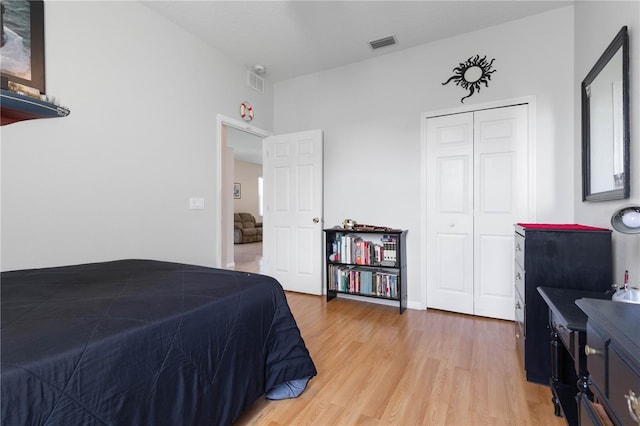54 Fieldstone Ln, Palm Coast, FL 32137 - bedroom with light wood finished floors and a closet