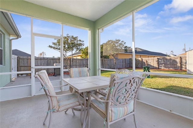 54 Fieldstone Ln, Palm Coast, FL 32137 - sunroom with outdoor dining space