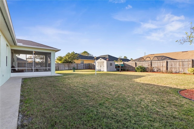 54 Fieldstone Ln, Palm Coast, FL 32137 - fenced backyard featuring a shed and a sunroom