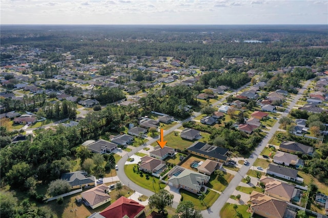 54 Fieldstone Ln, Palm Coast, FL 32137 - aerial view of property's location with nearby suburban area and a forest