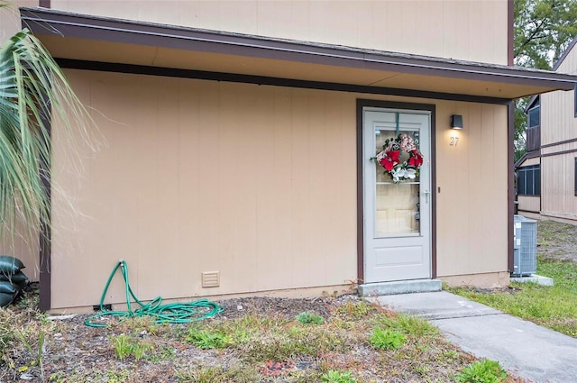 view of exterior entry featuring cooling unit