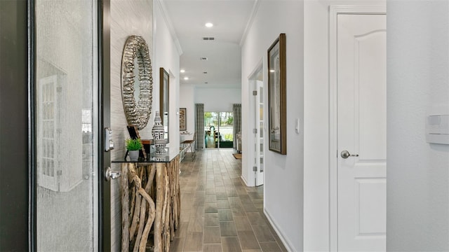 hall with crown molding and dark wood-type flooring