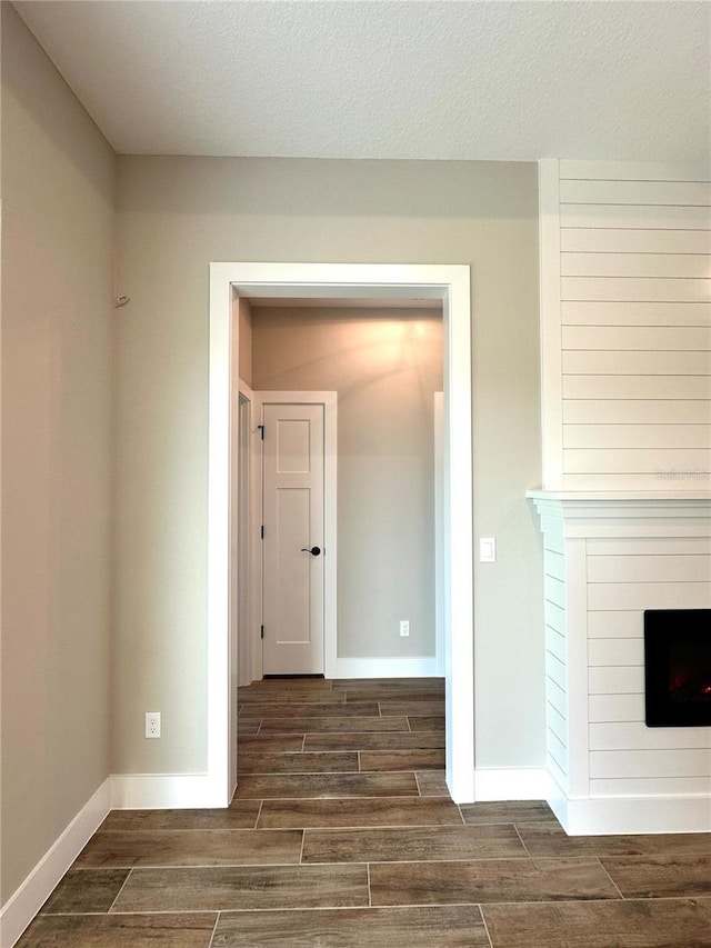 36 Armand Beach Dr, Palm Coast, FL 32137 - hallway featuring wood tiled floors and a textured ceiling