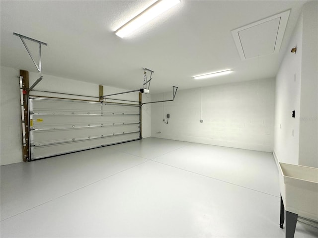 36 Armand Beach Dr, Palm Coast, FL 32137 - garage with a garage door opener