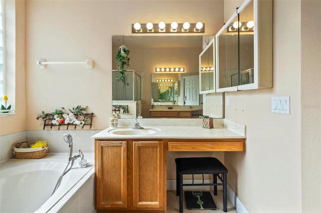 bathroom featuring independent shower and bath and vanity