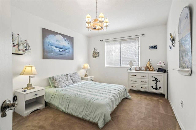 bedroom with a notable chandelier and carpet