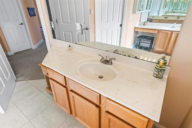 bathroom featuring tile patterned floors and vanity